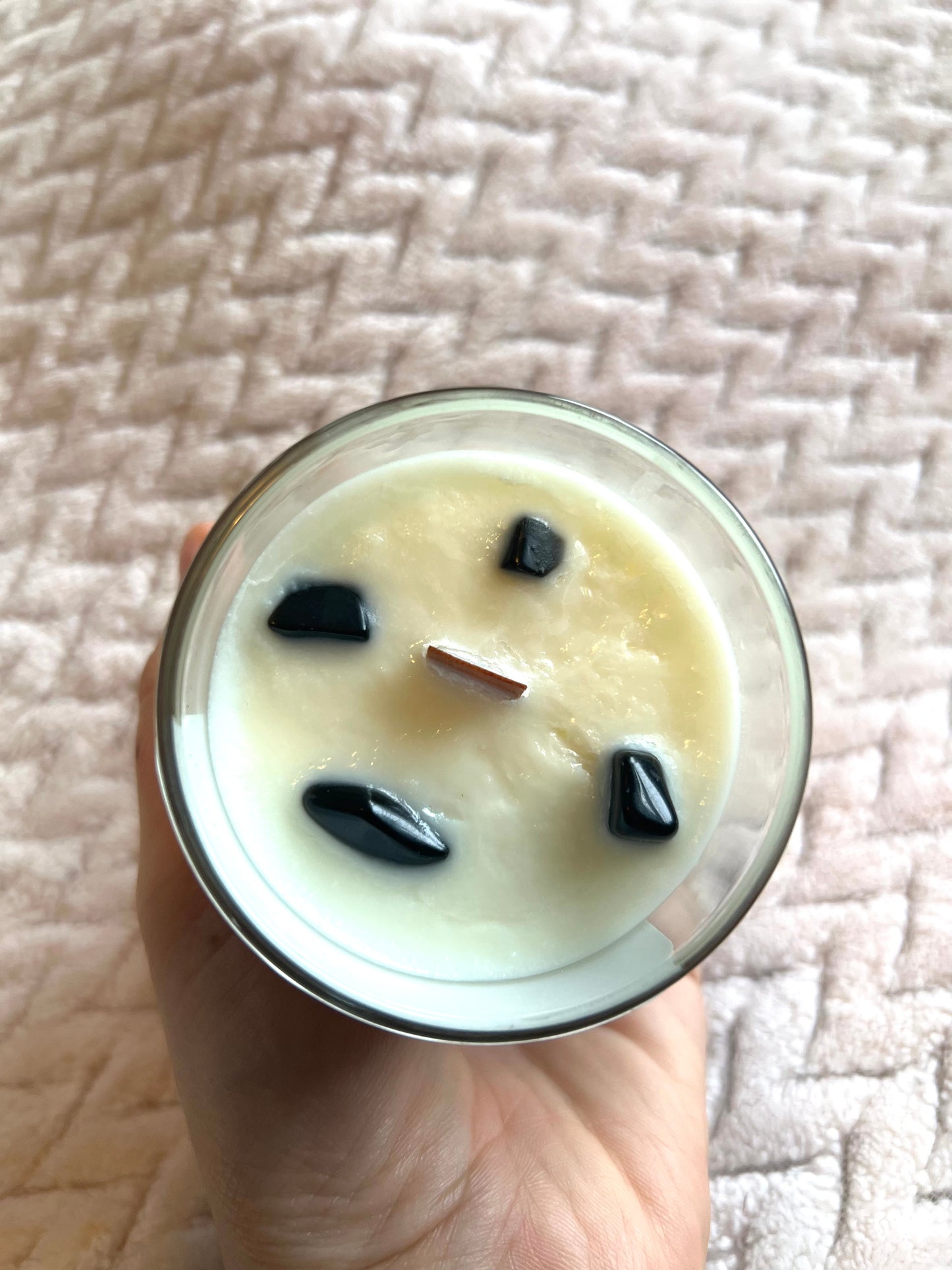 candle with black obsidian crystal, new moon, moon phases candles, patchouli and sandalwood